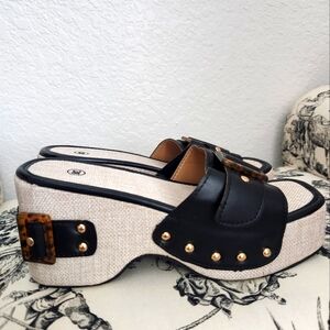 Stylish Black and Tan Platform Shoes with Leather Accents